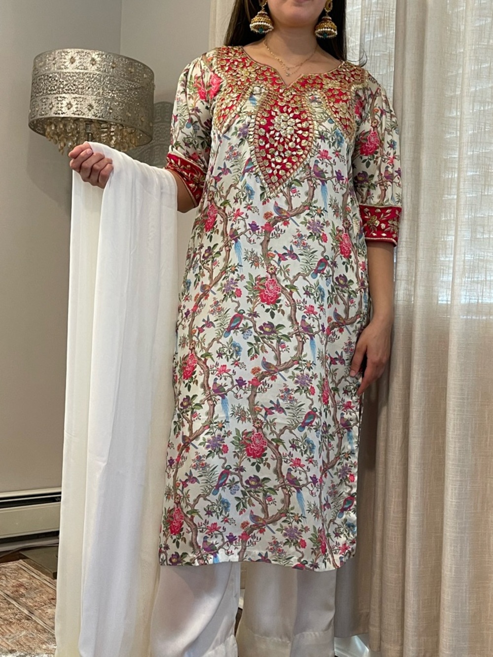 Floral kameez hoti neckline and 3 quarts sleevs with light mint Dupatta